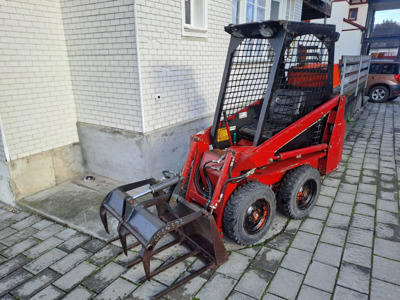 bobcat 313 mit Krokodilzange